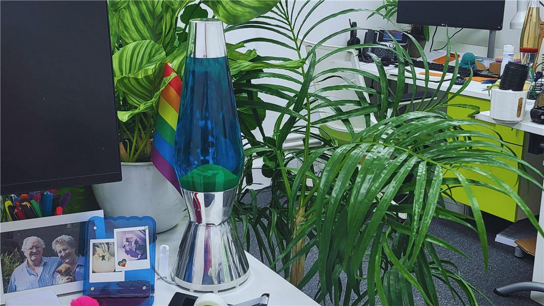The O’Brien Media office with a lava lamp and pride flag